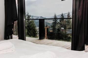 Фото номера Дом с 4 спальнями Дома для отпуска Alpine Lounge г. Ватра-Дорней 68