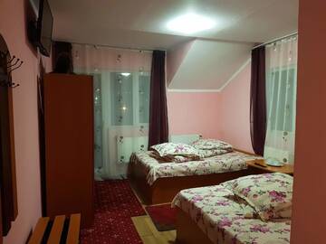 Фото номера Четырехместный номер Гостевой дом Casa Emilia г. Ватра-Дорней 2