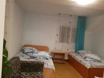 Фото номера Четырехместный номер Гостевой дом Casa Emilia г. Ватра-Дорней 3