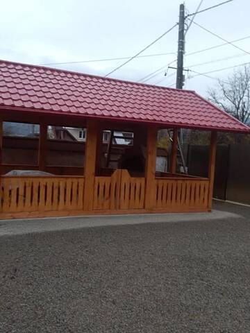 Фото номера Двухместный номер с двуспальной кроватью и дополнительной кроватью Гостевой дом De la mare la munte г. Ватра-Дорней 14