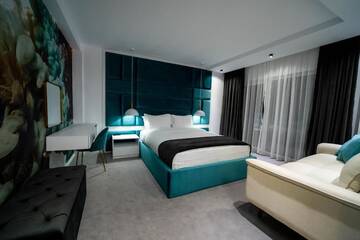Фото номера Номер Делюкс (для 2 взрослых и 1 ребенка) Гостевой дом Velvet Home г. Ватра-Дорней 23