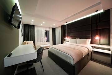 Фото номера Номер Делюкс (для 2 взрослых и 1 ребенка) Гостевой дом Velvet Home г. Ватра-Дорней 30