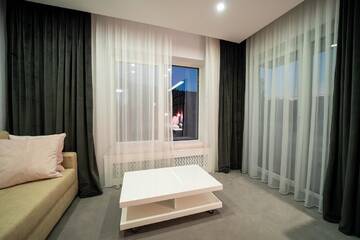 Фото номера Номер Делюкс (для 2 взрослых и 1 ребенка) Гостевой дом Velvet Home г. Ватра-Дорней 18