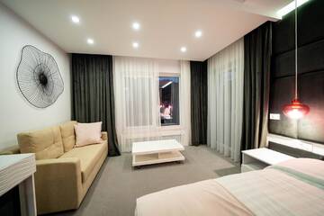 Фото номера Номер Делюкс (для 2 взрослых и 1 ребенка) Гостевой дом Velvet Home г. Ватра-Дорней 14