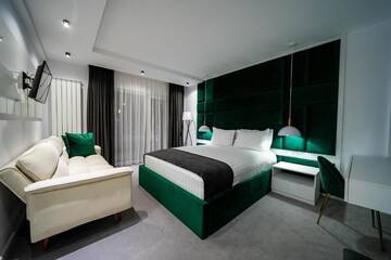 Фото номера Номер Делюкс (для 2 взрослых и 1 ребенка) Гостевой дом Velvet Home г. Ватра-Дорней 35